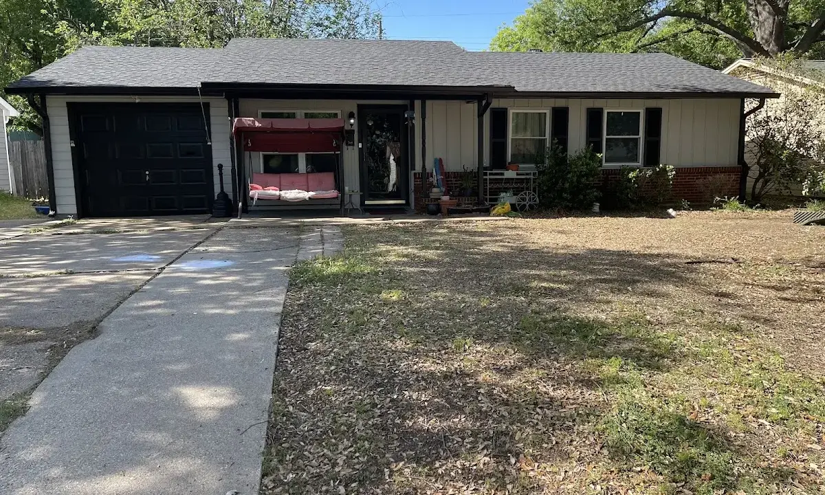 Asphalt Shingle Roof Repair crew at work on a residential roof in Redan